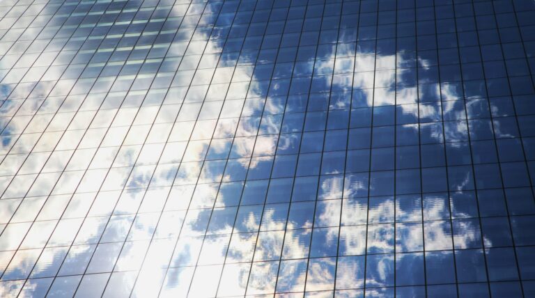 Reflection of clouds on a skyscraper